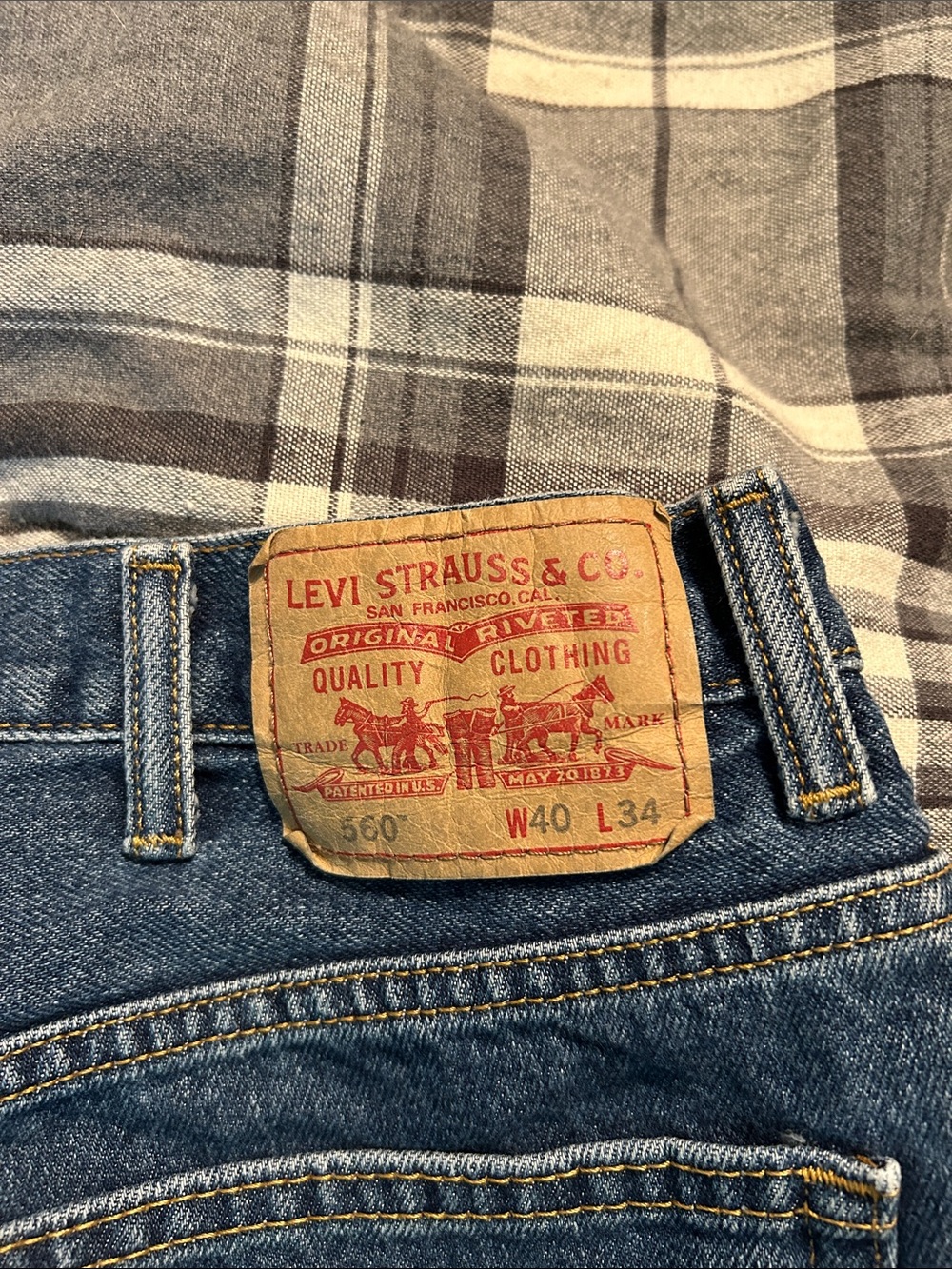 Levi's Men's Dark Blue Denim Jeans with Tan Leather Patch